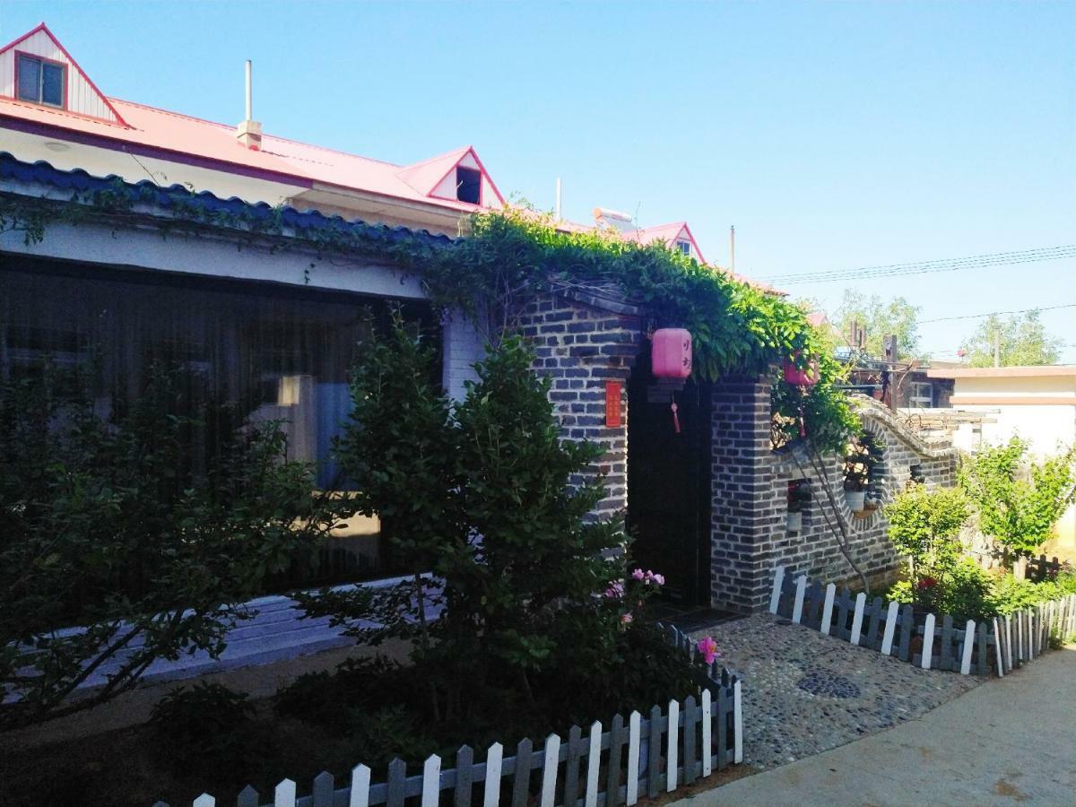 Guixu Huatang Homestay Qinhuangdao Esterno foto